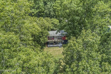 BRAND NEW ROOF! This waterfront family home has been in the - photo 51
