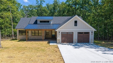 This newly constructed home showcases exceptional craftsmanship - photo 1