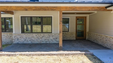 This newly constructed home showcases exceptional craftsmanship - photo 3