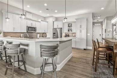 Welcome to Club Level living at Cypress at the Lake, widely - photo 3