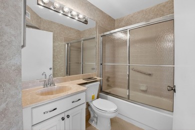 Enjoy tranquil lake views from this first-floor 3-bedroom - photo 16