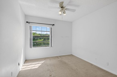 Enjoy tranquil lake views from this first-floor 3-bedroom - photo 19