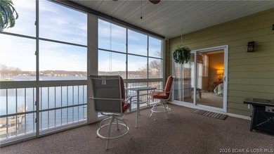 Enjoy panoramic lake views and outstanding value in this - photo 1