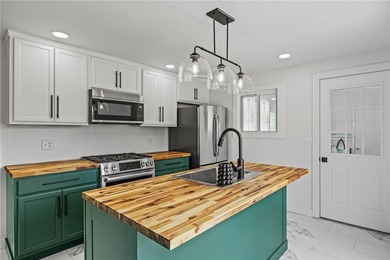Welcome to 112 Sharon Drive, a beautifully updated 3-bedroom - photo 9