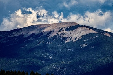 In the heart of the Angel Fire Valley lies a beloved, family-run - photo 50