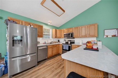 Escape to Lake of the Ozarks in this peaceful country setting - photo 7