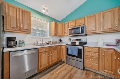 Escape to Lake of the Ozarks in this peaceful country setting - photo 8