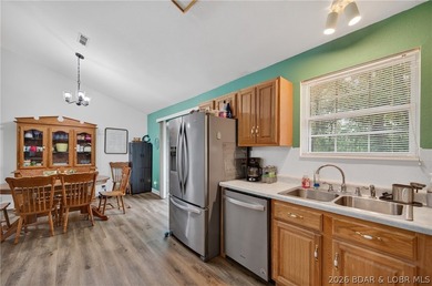 Escape to Lake of the Ozarks in this peaceful country setting - photo 9