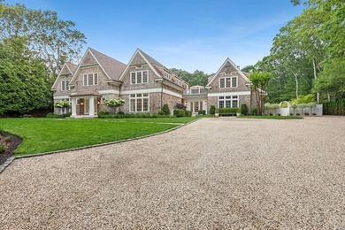 Tucked away at the end of a quiet cul-de-sac on 1.2 acres in the - photo 3