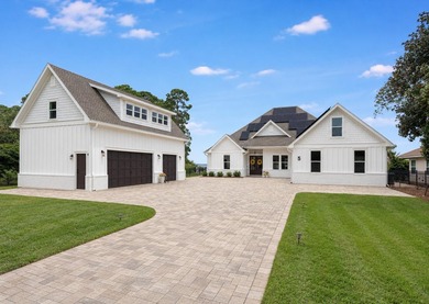 Bayfront Luxury. Endless Horizons. Waterfront Living. No HOA. A - photo 1