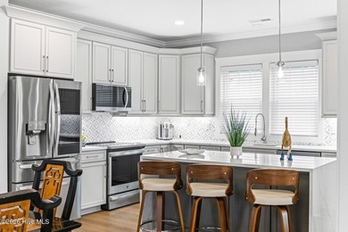 Discover coastal luxury at 367 Spicer Lake Drive, located in the