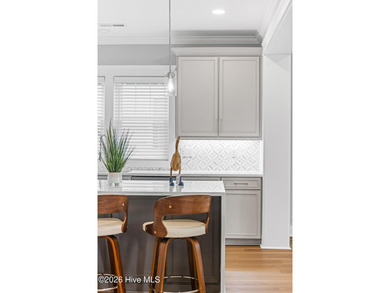 Discover coastal luxury at 367 Spicer Lake Drive, located in the