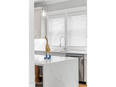 Discover coastal luxury at 367 Spicer Lake Drive, located in the