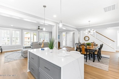 Discover coastal luxury at 367 Spicer Lake Drive, located in the