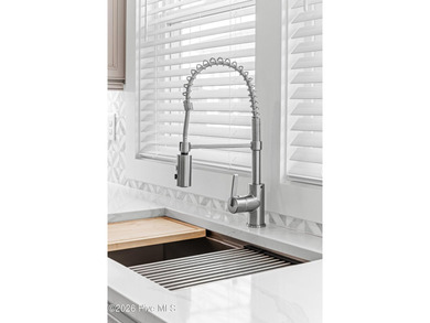 Discover coastal luxury at 367 Spicer Lake Drive, located in the