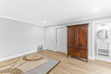 Discover coastal luxury at 367 Spicer Lake Drive, located in the