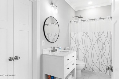 Discover coastal luxury at 367 Spicer Lake Drive, located in the