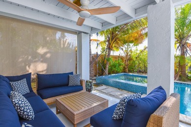 A true tropical oasis nestled on a 6,600 sq ft lot with lush - photo 22