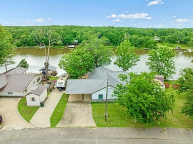 Lake living at its finest! Total custom remodel has all the - photo 3