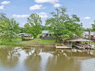 Lake living at its finest! Total custom remodel has all the - photo 8