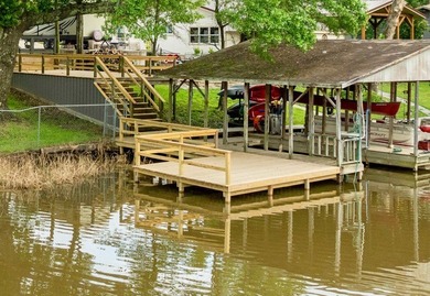 Lake living at its finest! Total custom remodel has all the - photo 10