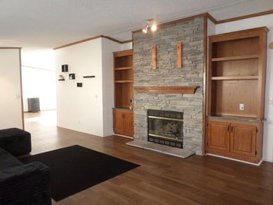 Welcome to desirable Summit Heights! This renovated double-wide