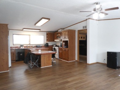 Welcome to desirable Summit Heights! This renovated double-wide