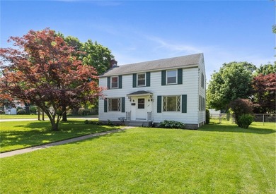 Classic Colonial in the heart of Irondequoit! Situated on a - photo 1