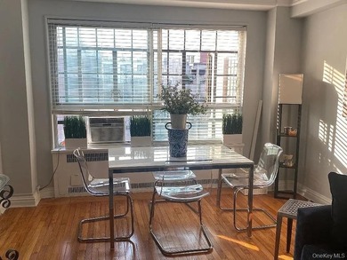 This tastefully renovated studio sits high on the 17th floor of - photo 2