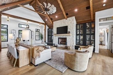 Experience refined lake living in this exceptional - photo 2