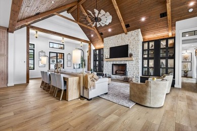 Experience refined lake living in this exceptional - photo 5