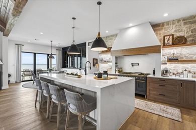 Experience refined lake living in this exceptional - photo 9