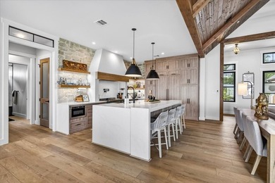 Experience refined lake living in this exceptional - photo 10