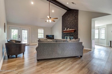 Situated on 1.5 acres in the peaceful Gulfport countryside, this - photo 2