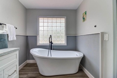 Situated on 1.5 acres in the peaceful Gulfport countryside, this - photo 5