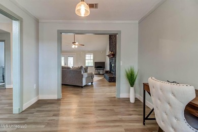Situated on 1.5 acres in the peaceful Gulfport countryside, this - photo 9