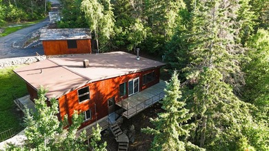 This 4BR, 2BA Rainy Lake property offers 100' of accessible - photo 5