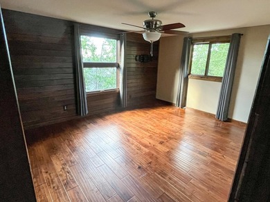 This 4BR, 2BA Rainy Lake property offers 100' of accessible - photo 8