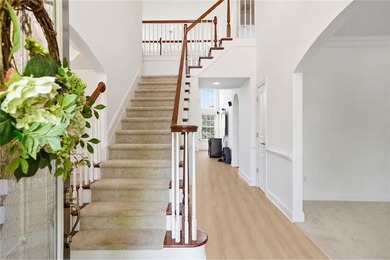 NEW FLOORING!! NEW CARPET!! Welcome to a beautifully maintained - photo 4