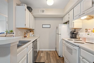 Lowest Priced 3rd Floor 2 bed / 2 bath, move in ready unit is - photo 12