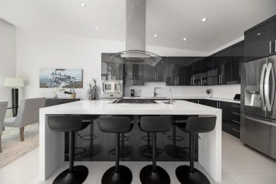 Bright lights. Big city views. This 4500 sq ft custom built - photo 14