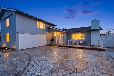 Beautifully remodeled and move-in ready, this spacious 5-bedroom - photo 1