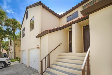 This 3-bedroom, 2-bath townhome with a 1-car garage is located - photo 1