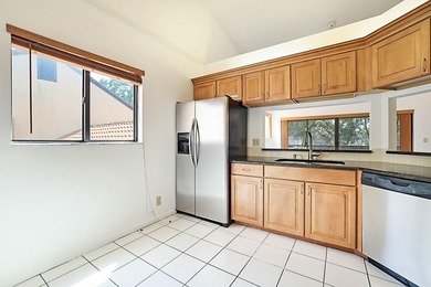 This 3-bedroom, 2-bath townhome with a 1-car garage is located - photo 3