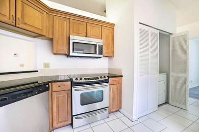 This 3-bedroom, 2-bath townhome with a 1-car garage is located - photo 4