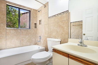 This 3-bedroom, 2-bath townhome with a 1-car garage is located - photo 8
