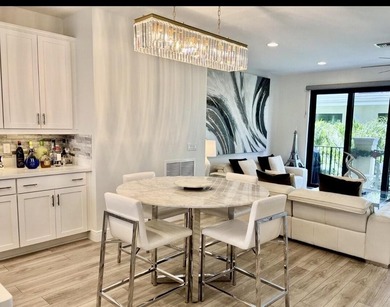 Welcome to this stunning tri-level Mediterranean-style townhome - photo 13