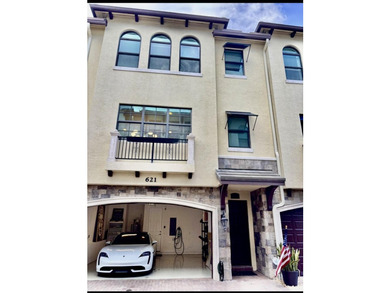 Welcome to this stunning tri-level Mediterranean-style townhome - photo 24