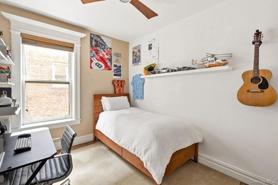 Perched above the treetops of Prospect Park, Residence 3L at 86 - photo 11