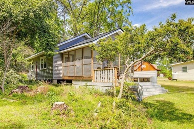 Enjoy the perfect lake escape with this charming waterfront - photo 3
